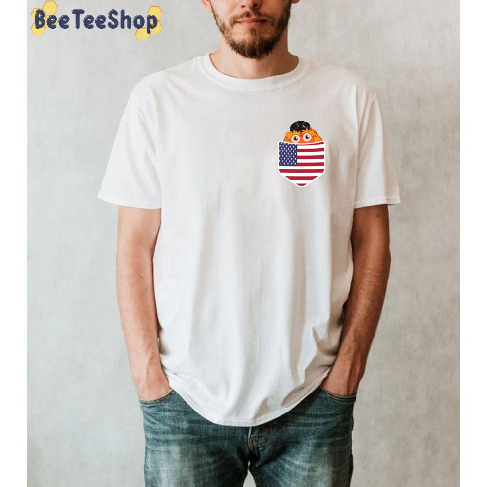 Mascot Gritty In Pocket American Flag Philadelphia Flyers Hockey Unisex T-Shirt Mascot Gritty In Pocket American Flag Philadelphia Flyers Hockey Unisex T-Shirt