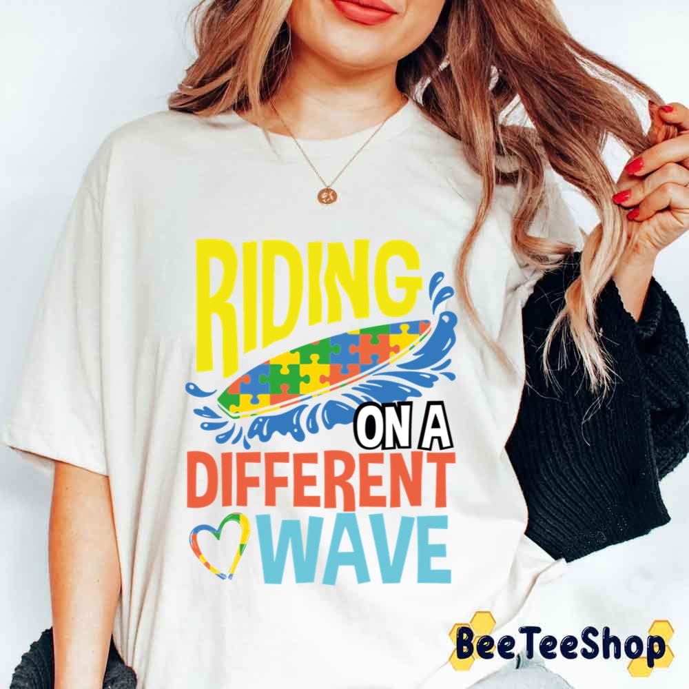 Riding On A Different Wave Ribbon Puzzle Autism Awareness Unisex T-Shirt Riding On A Different Wave Ribbon Puzzle Autism Awareness Unisex T-Shirt