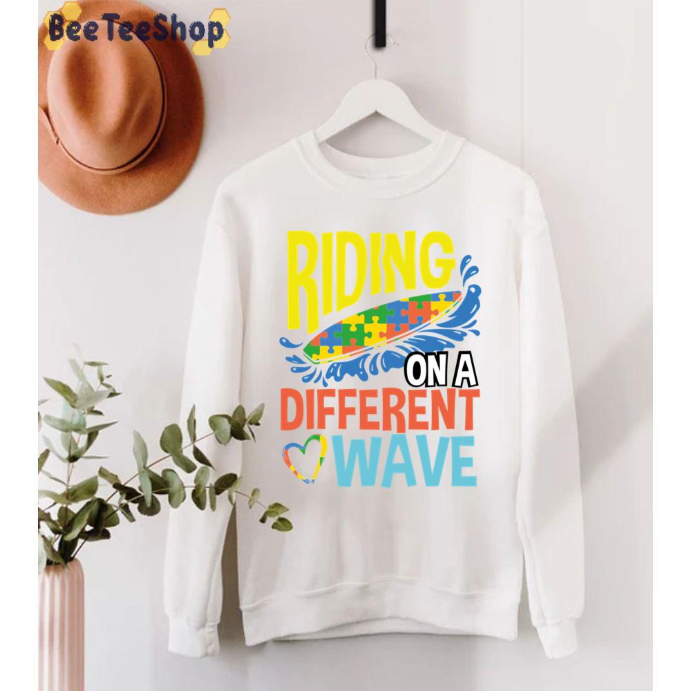 Riding On A Different Wave Ribbon Puzzle Autism Awareness Unisex T-Shirt Riding On A Different Wave Ribbon Puzzle Autism Awareness Unisex T-Shirt