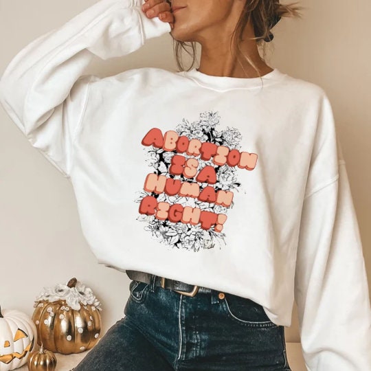 Abortion Is A Human Right Pro-Choice Unisex Sweatshirt Abortion Is A Human Right Pro-Choice Unisex Sweatshirt