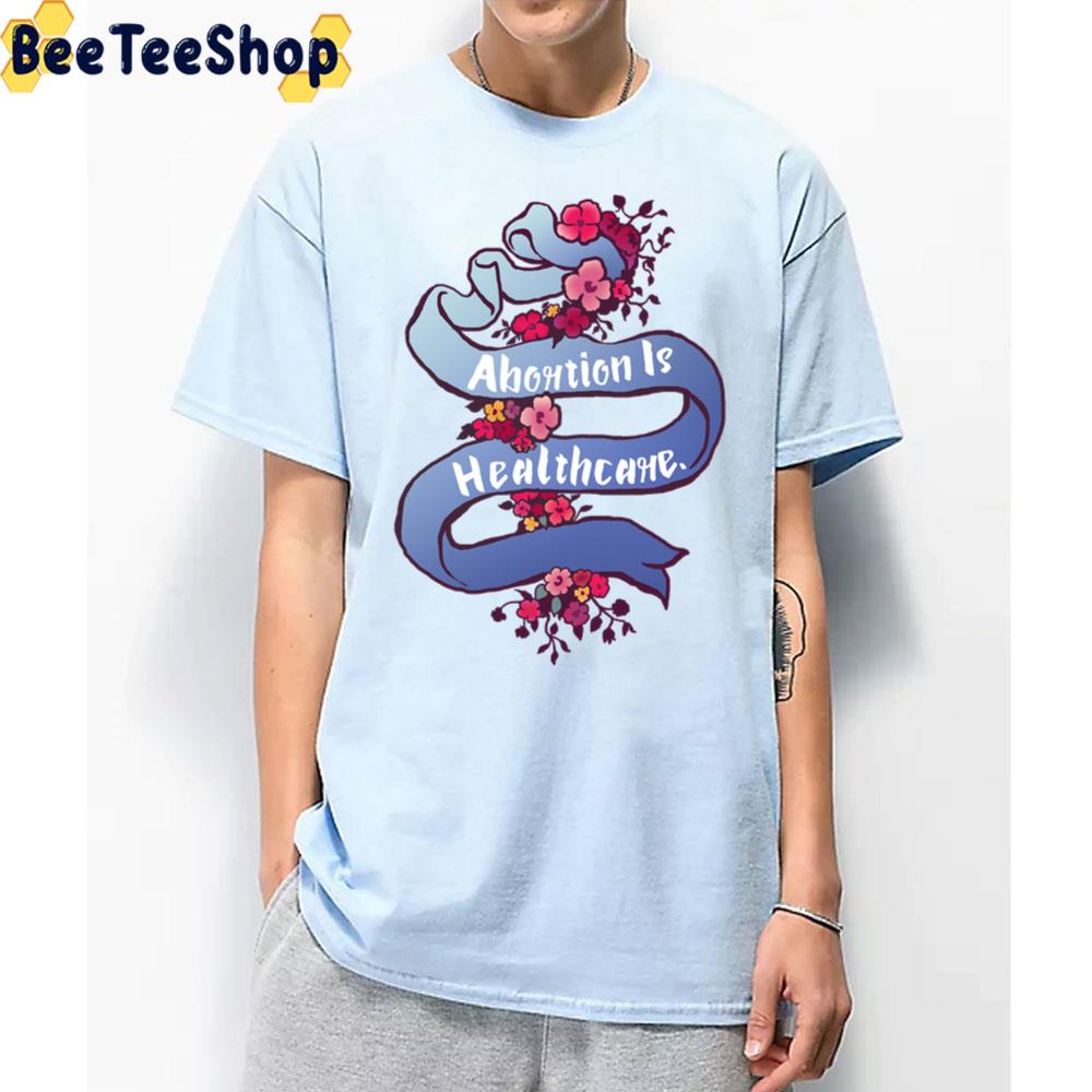 Abortion Is Healthcare Ribbon Art Unisex T-Shirt Abortion Is Healthcare Ribbon Art Unisex T-Shirt