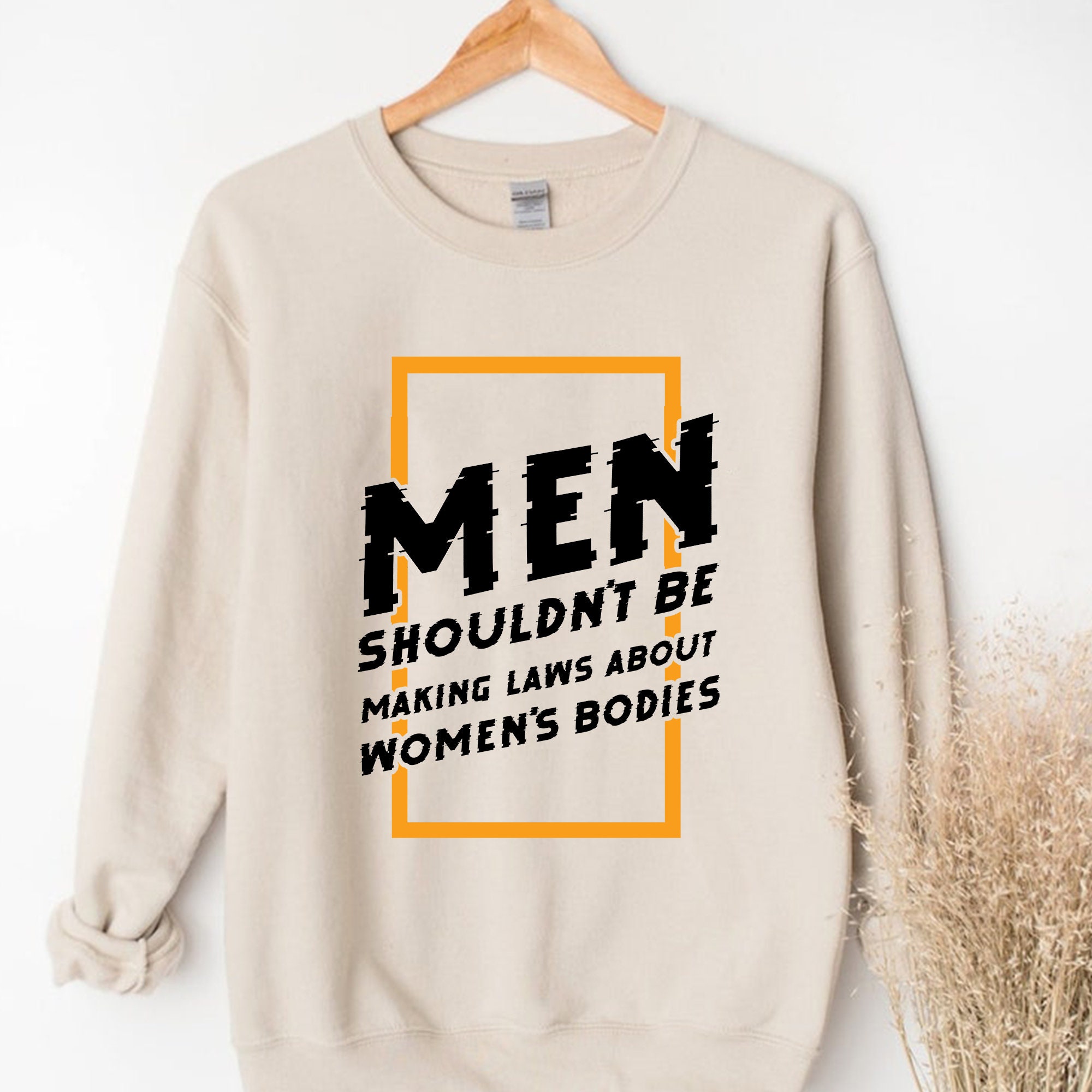 Men Shouldn't Be Making Laws About Women's Bodies Unisex Sweatshirt Men Shouldn't Be Making Laws About Women's Bodies Unisex Sweatshirt