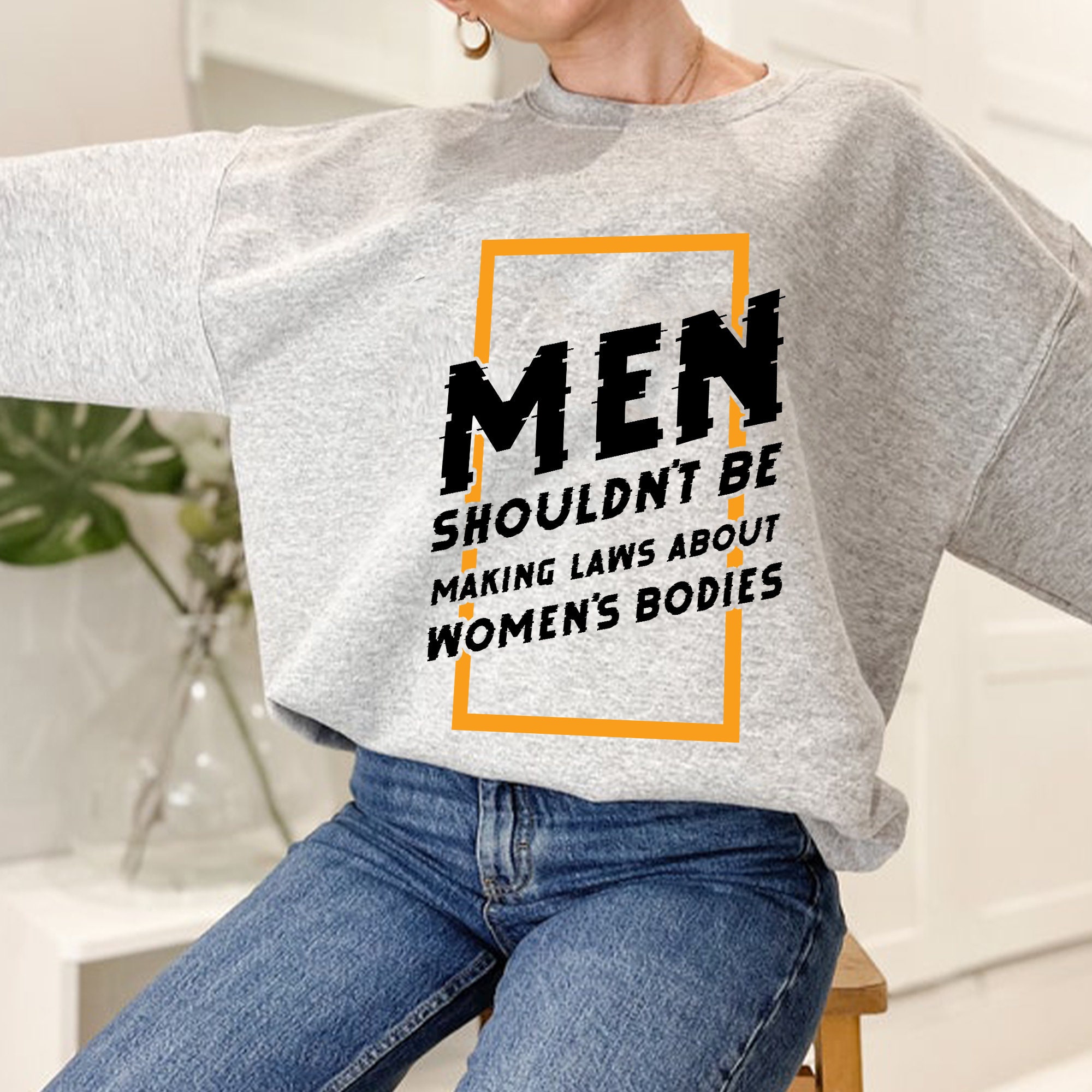 Men Shouldn't Be Making Laws About Women's Bodies Unisex Sweatshirt Men Shouldn't Be Making Laws About Women's Bodies Unisex Sweatshirt