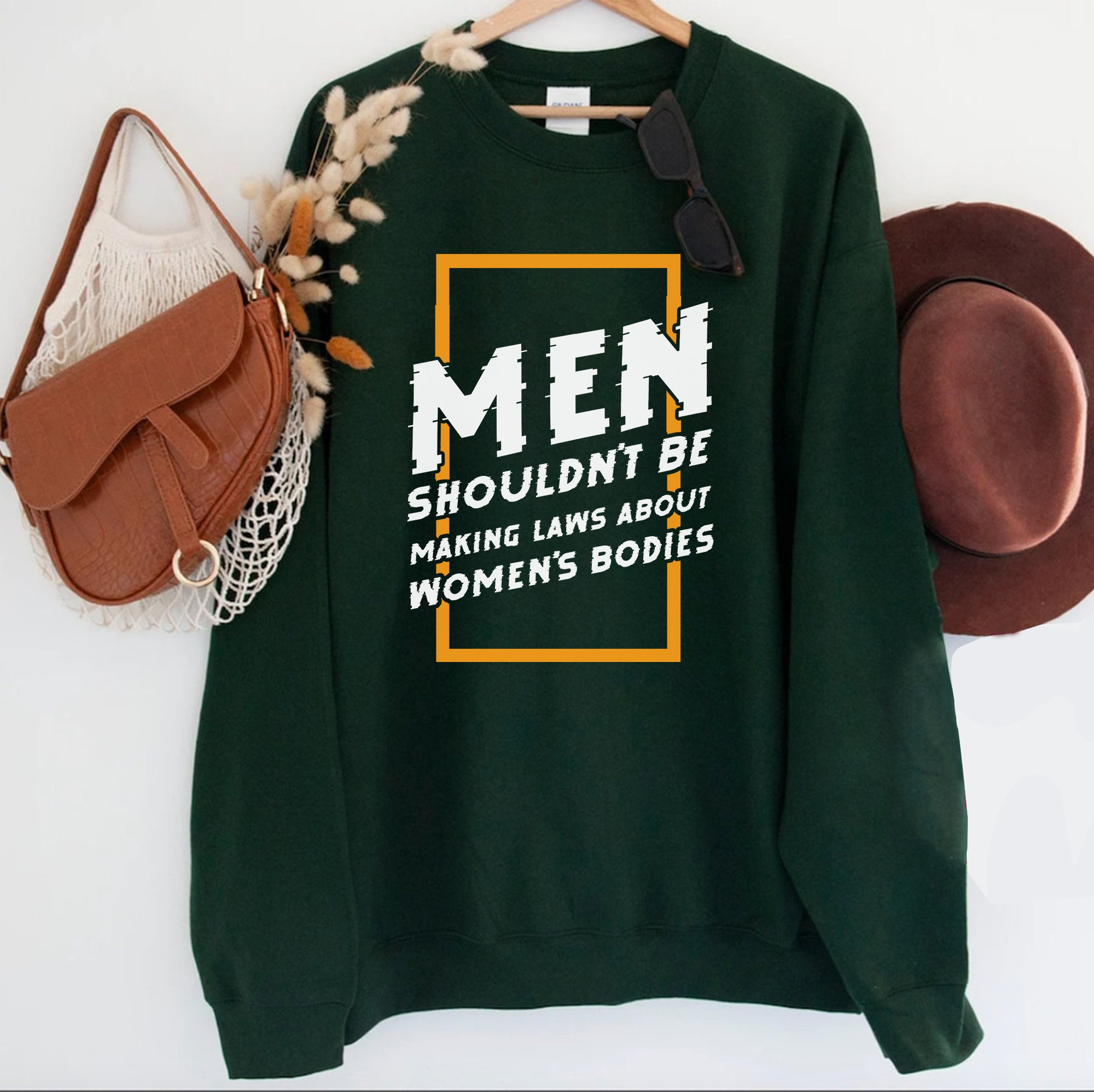 Men Shouldn't Be Making Laws About Women's Bodies Unisex Sweatshirt Men Shouldn't Be Making Laws About Women's Bodies Unisex Sweatshirt