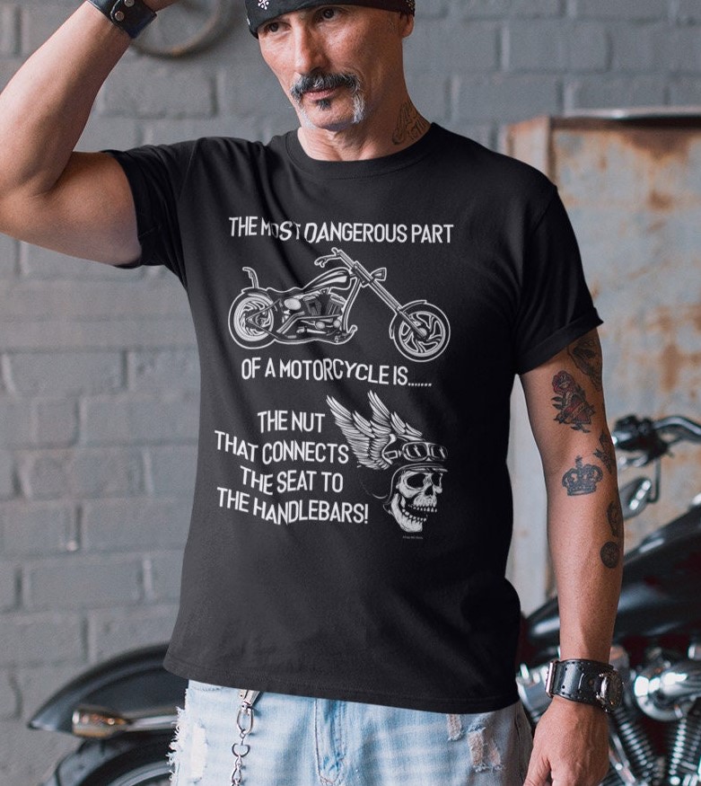Mens Funny Biker The Most Dangerous Part Of A Motorcycle Unisex T-Shirt Mens Funny Biker The Most Dangerous Part Of A Motorcycle Unisex T-Shirt