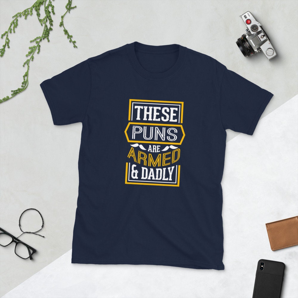 These Puns Are Armed & Dadly Father's Day Unisex T-Shirt These Puns Are Armed & Dadly Father's Day Unisex T-Shirt