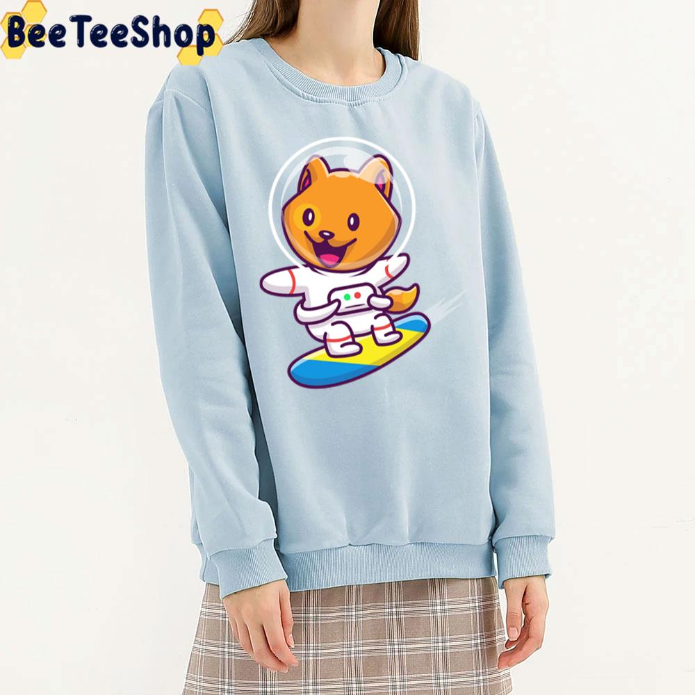 Cute Cat Astronaut Surfing In Space Cartoon Unisex T-Shirt Cute Cat Astronaut Surfing In Space Cartoon Unisex T-Shirt