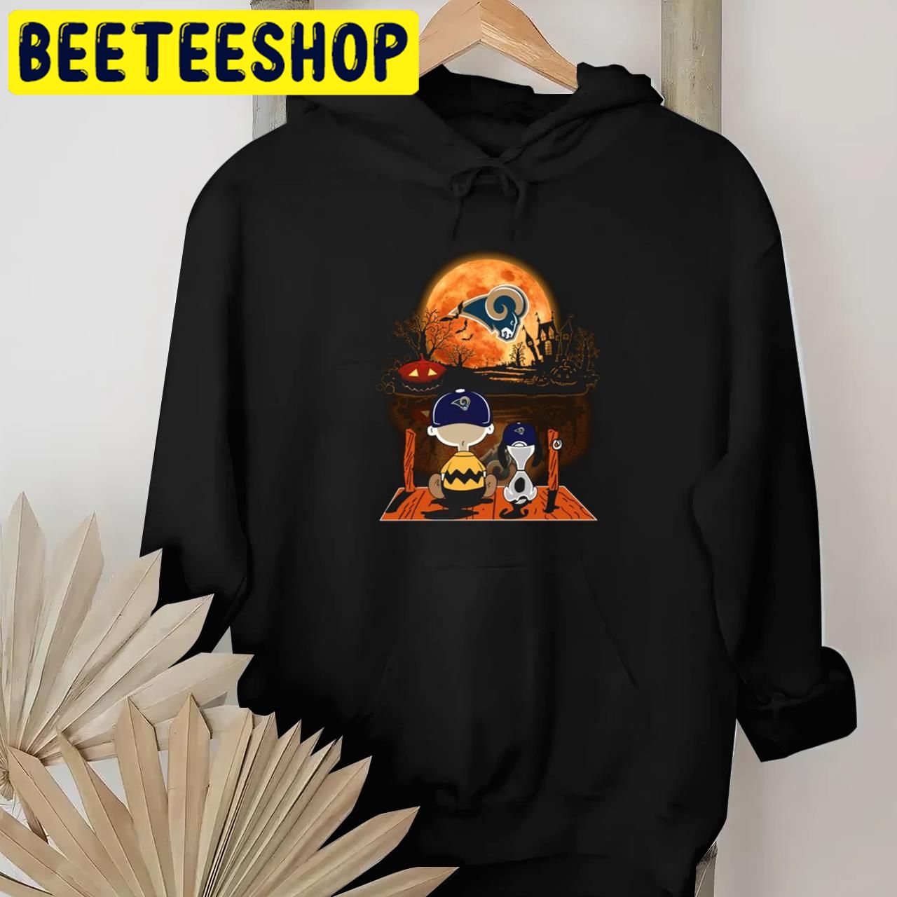 Charlie Brown And Snoopy Watching Los Angeles Rams Halloween Trending Unisex T-Shirt Charlie Brown And Snoopy Watching Los Angeles Rams Halloween Trending Unisex T-Shirt