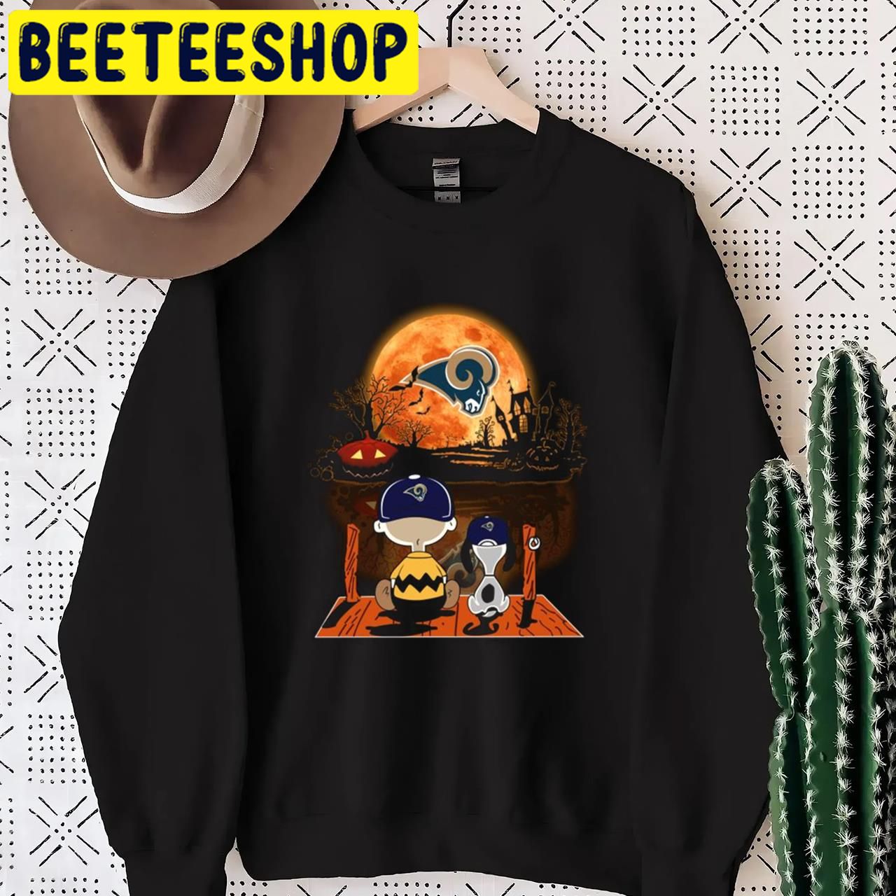 Charlie Brown And Snoopy Watching Los Angeles Rams Halloween Trending Unisex T-Shirt Charlie Brown And Snoopy Watching Los Angeles Rams Halloween Trending Unisex T-Shirt