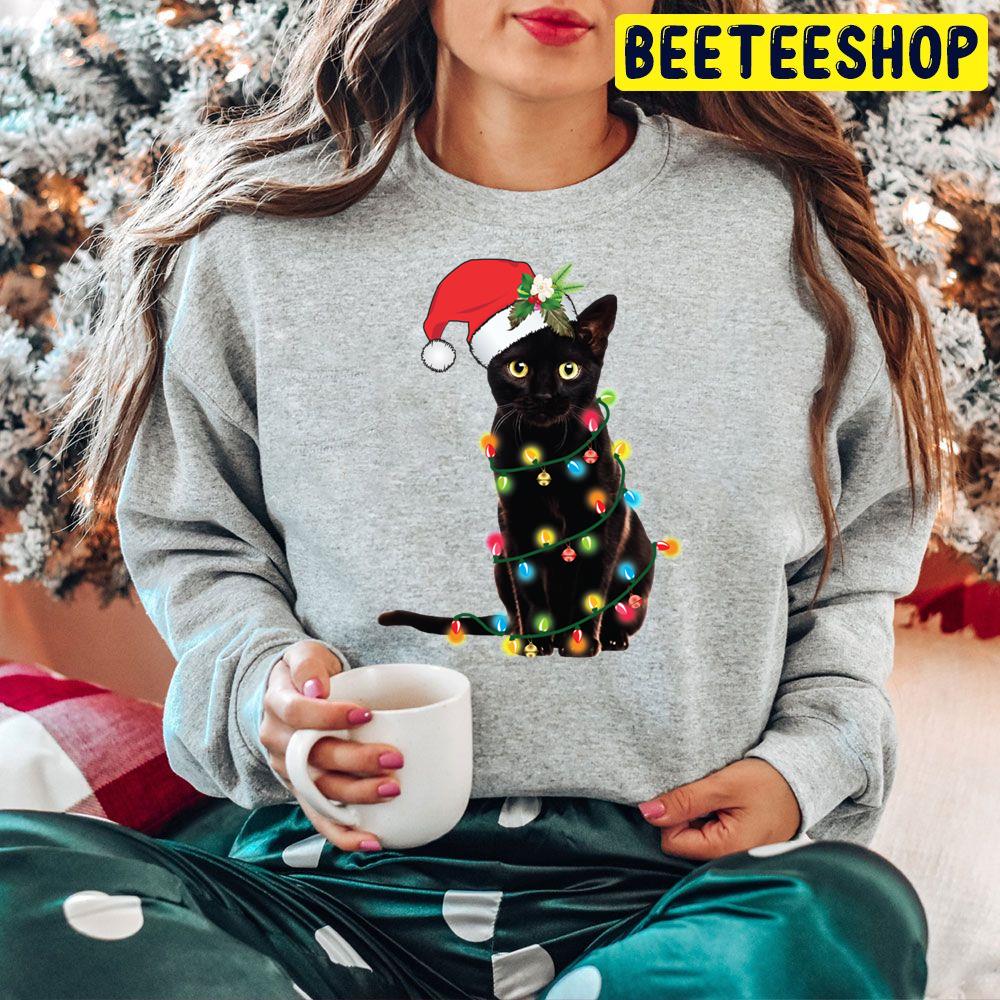 Black Santa Cat Tangled Up In Lights Christmas Santa Trending Unisex Hoodie Black Santa Cat Tangled Up In Lights Christmas Santa Trending Unisex Hoodie