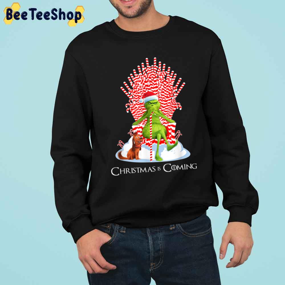 Christmas Is Coming Grinch And Dog Trending Unisex Sweatshirt Christmas Is Coming Grinch And Dog Trending Unisex Sweatshirt