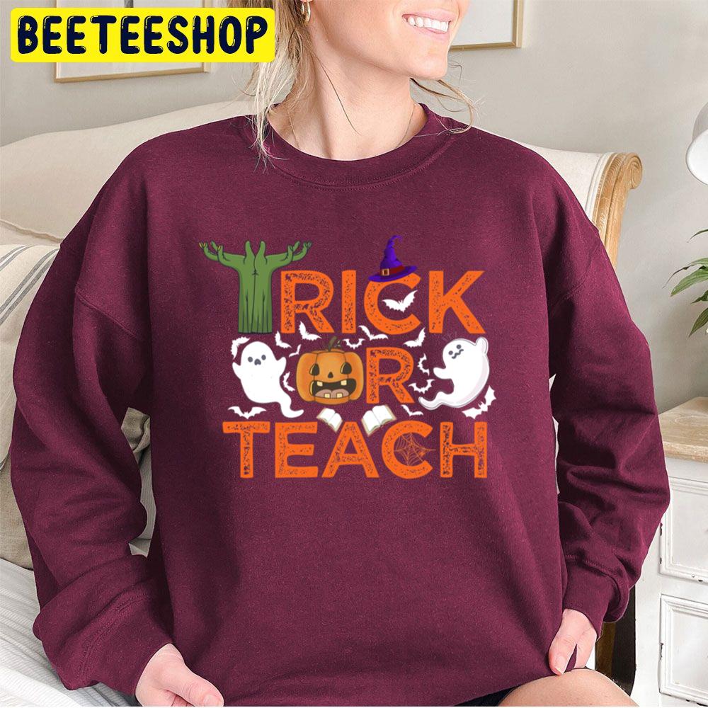Cute Boo Trick Or Teach Funny Halloween Teacher Unisex Sweatshirt Cute Boo Trick Or Teach Funny Halloween Teacher Unisex Sweatshirt