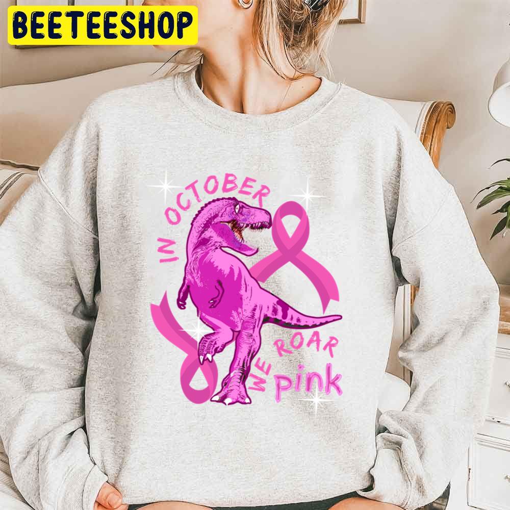 In October We Wear Pink Dinosaurs Trending Unisex Sweatshirt In October We Wear Pink Dinosaurs Trending Unisex Sweatshirt