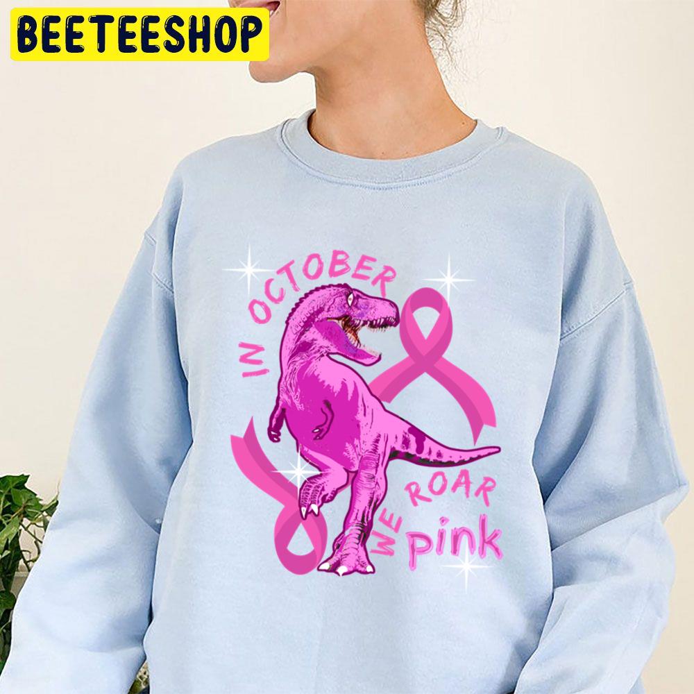 In October We Wear Pink Dinosaurs Trending Unisex Sweatshirt In October We Wear Pink Dinosaurs Trending Unisex Sweatshirt