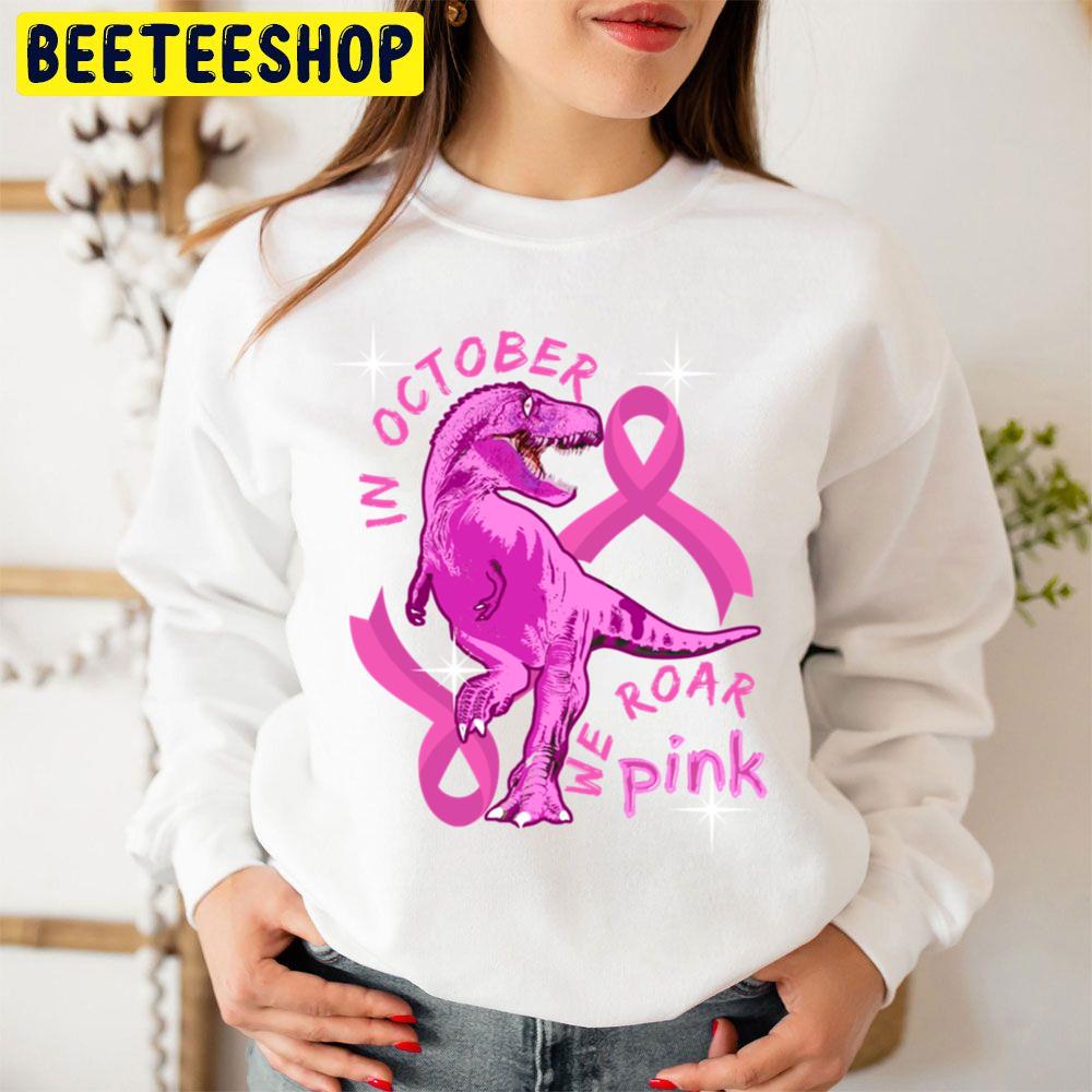 In October We Wear Pink Dinosaurs Trending Unisex Sweatshirt In October We Wear Pink Dinosaurs Trending Unisex Sweatshirt