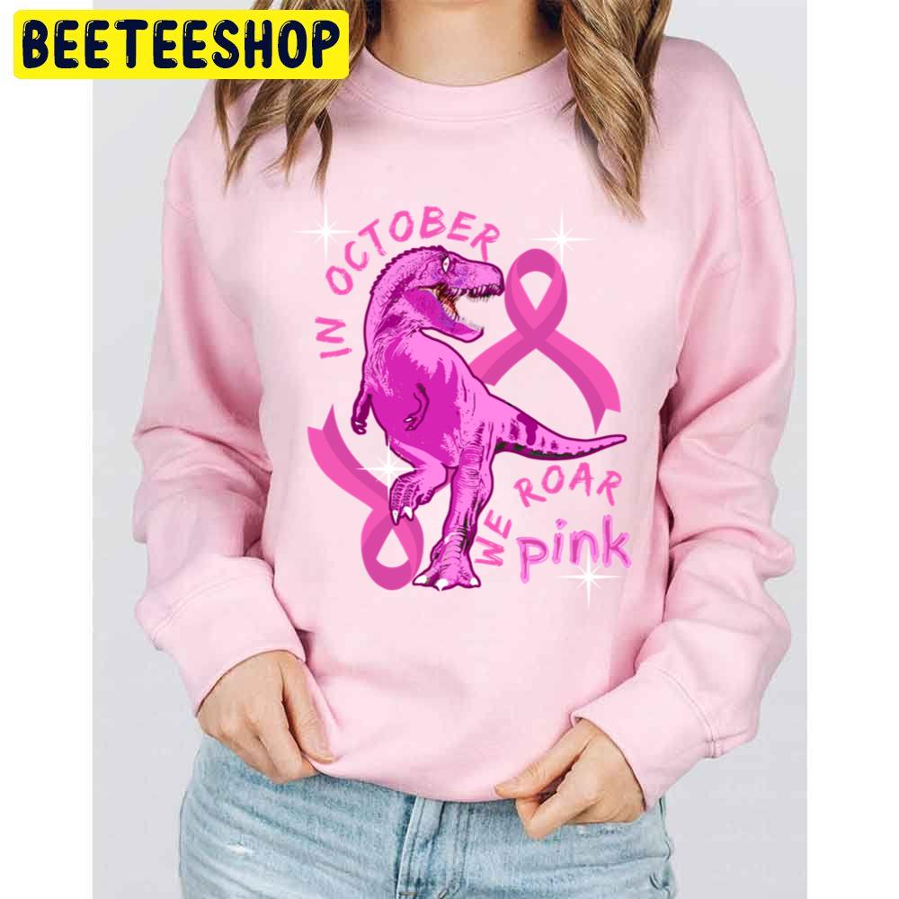 In October We Wear Pink Dinosaurs Trending Unisex Sweatshirt In October We Wear Pink Dinosaurs Trending Unisex Sweatshirt