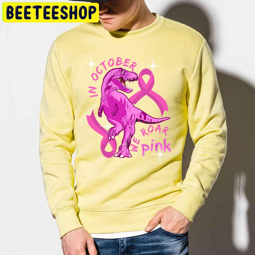 In October We Wear Pink Dinosaurs Trending Unisex Sweatshirt In October We Wear Pink Dinosaurs Trending Unisex Sweatshirt