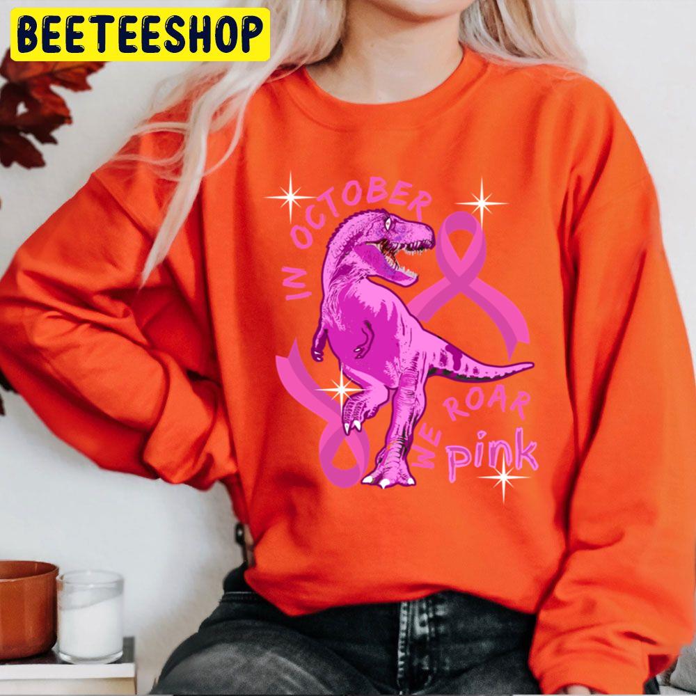 In October We Wear Pink Dinosaurs Trending Unisex Sweatshirt In October We Wear Pink Dinosaurs Trending Unisex Sweatshirt