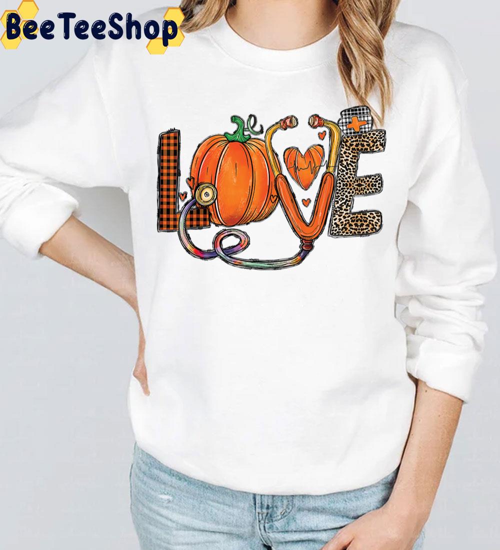 Love Nurse Pumpkin And Heart Halloween Trending Unisex Sweatshirt Love Nurse Pumpkin And Heart Halloween Trending Unisex Sweatshirt