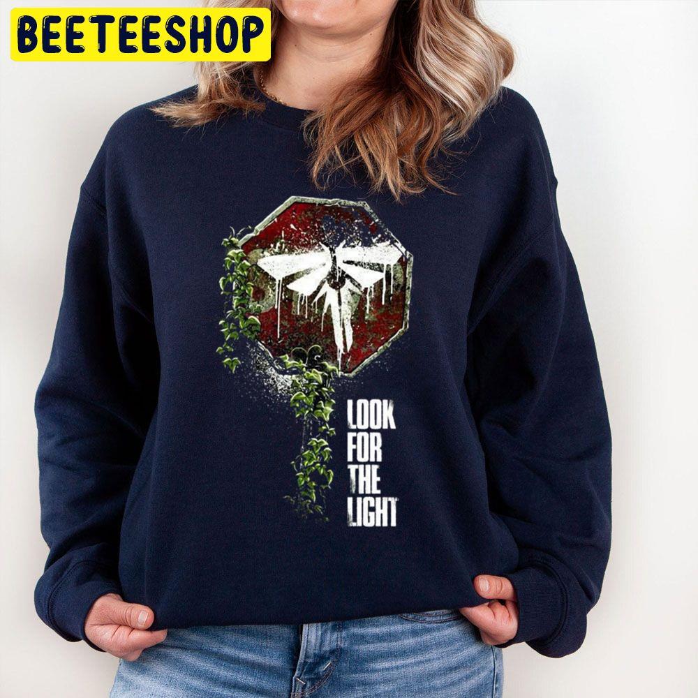 The Last Of Us Joel And Ellie Family Trending Unisex Sweatshirt The Last Of Us Joel And Ellie Family Trending Unisex Sweatshirt