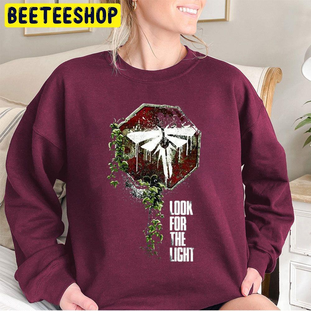 The Last Of Us Joel And Ellie Family Trending Unisex Sweatshirt The Last Of Us Joel And Ellie Family Trending Unisex Sweatshirt
