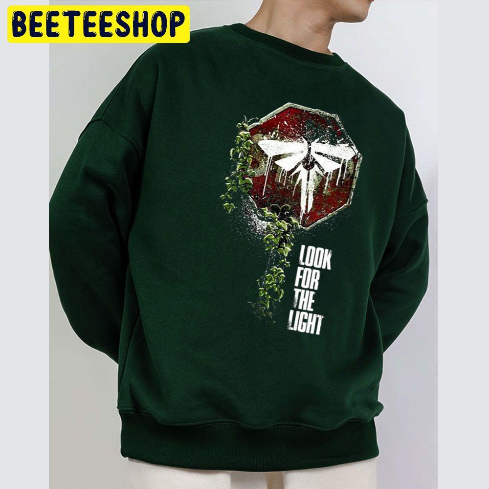 The Last Of Us Joel And Ellie Family Trending Unisex Sweatshirt The Last Of Us Joel And Ellie Family Trending Unisex Sweatshirt