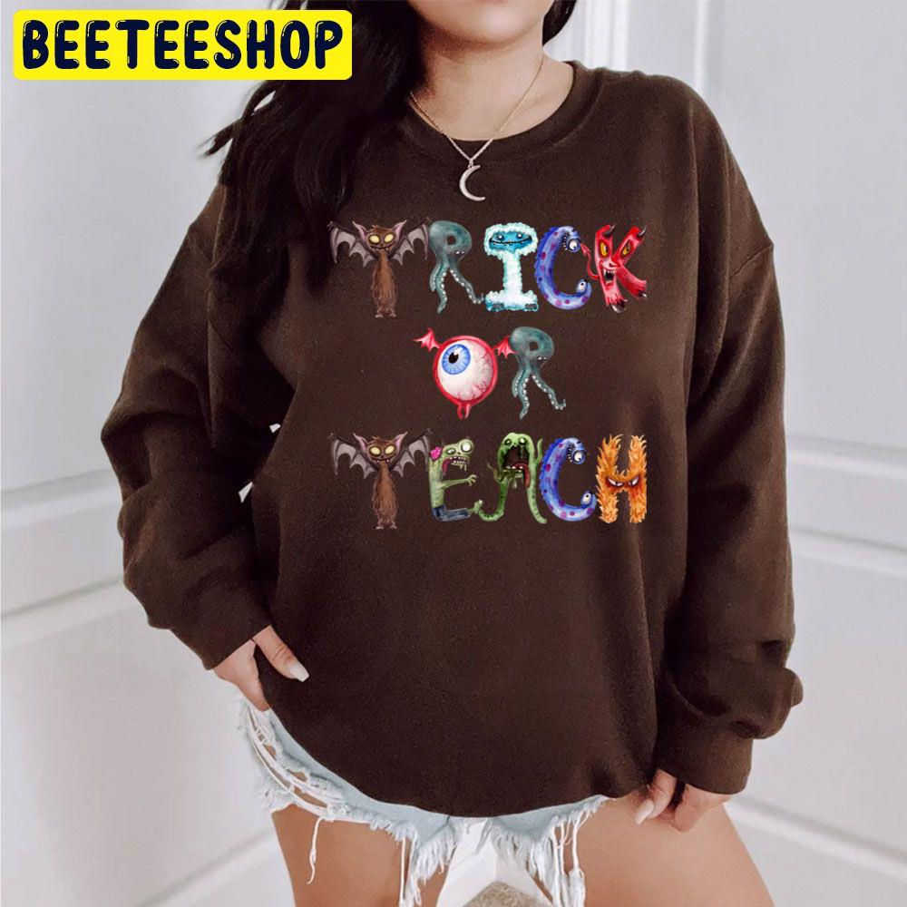 Trick Or Teach Cute Happy Halloween Teacher Unisex Sweatshirt Trick Or Teach Cute Happy Halloween Teacher Unisex Sweatshirt