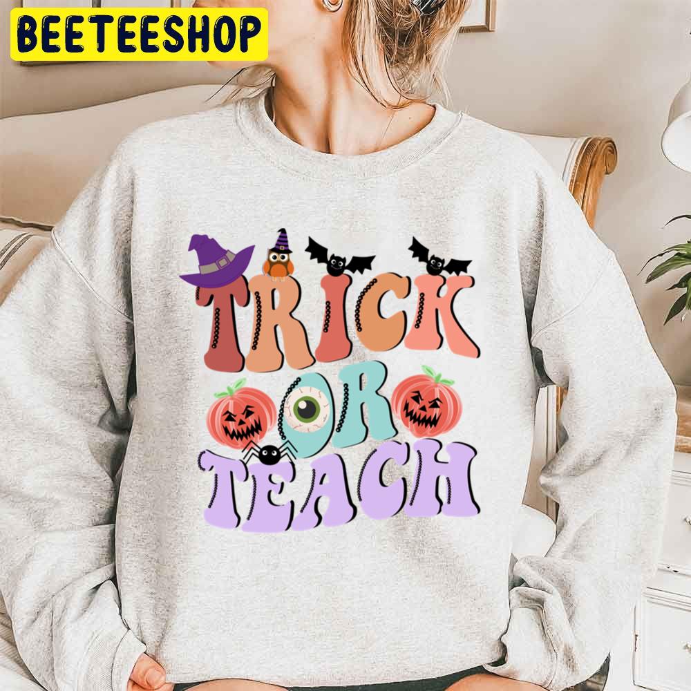 Trick Or Teach Funny Halloween For Teacher Unisex Sweatshirt Trick Or Teach Funny Halloween For Teacher Unisex Sweatshirt