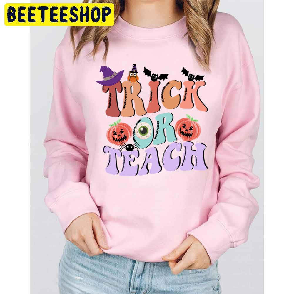 Trick Or Teach Funny Halloween For Teacher Unisex Sweatshirt Trick Or Teach Funny Halloween For Teacher Unisex Sweatshirt