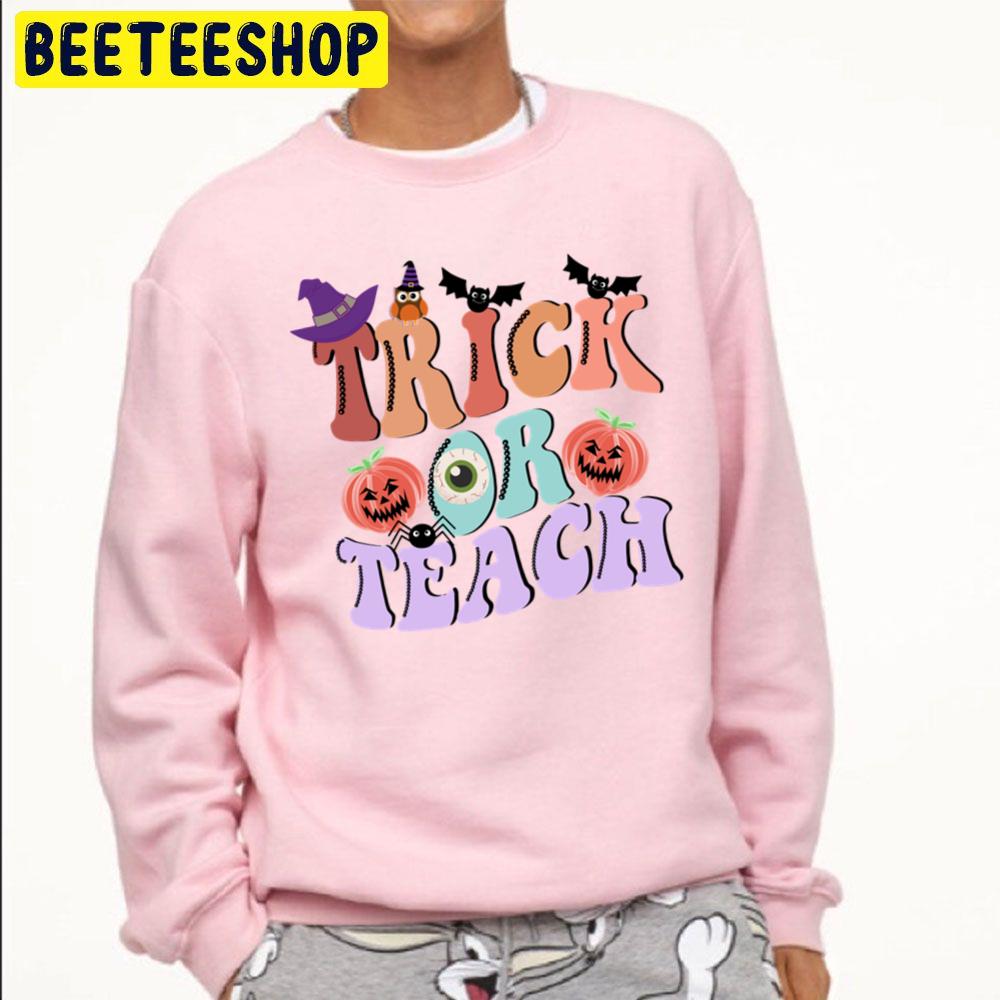 Trick Or Teach Funny Halloween For Teacher Unisex Sweatshirt Trick Or Teach Funny Halloween For Teacher Unisex Sweatshirt