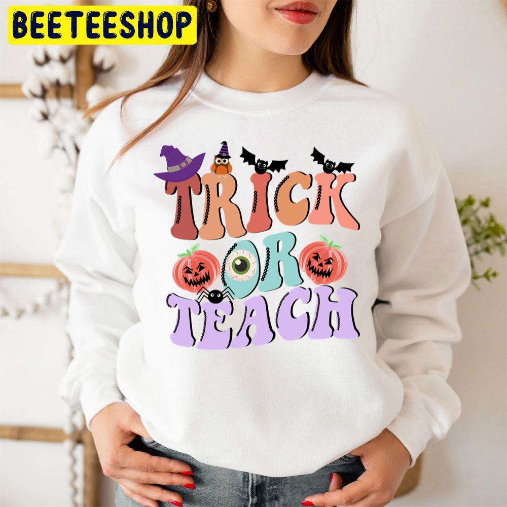 Trick Or Teach Funny Halloween For Teacher Unisex Sweatshirt Trick Or Teach Funny Halloween For Teacher Unisex Sweatshirt