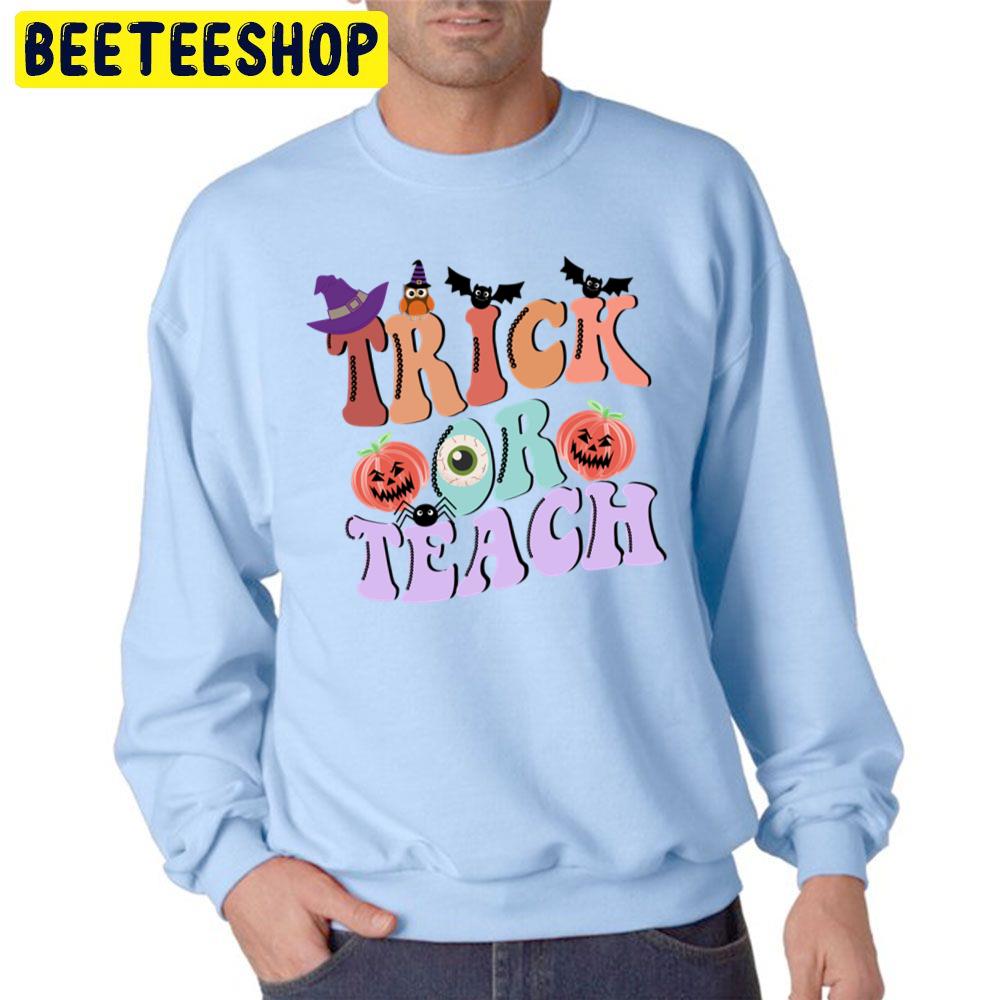 Trick Or Teach Funny Halloween For Teacher Unisex Sweatshirt Trick Or Teach Funny Halloween For Teacher Unisex Sweatshirt