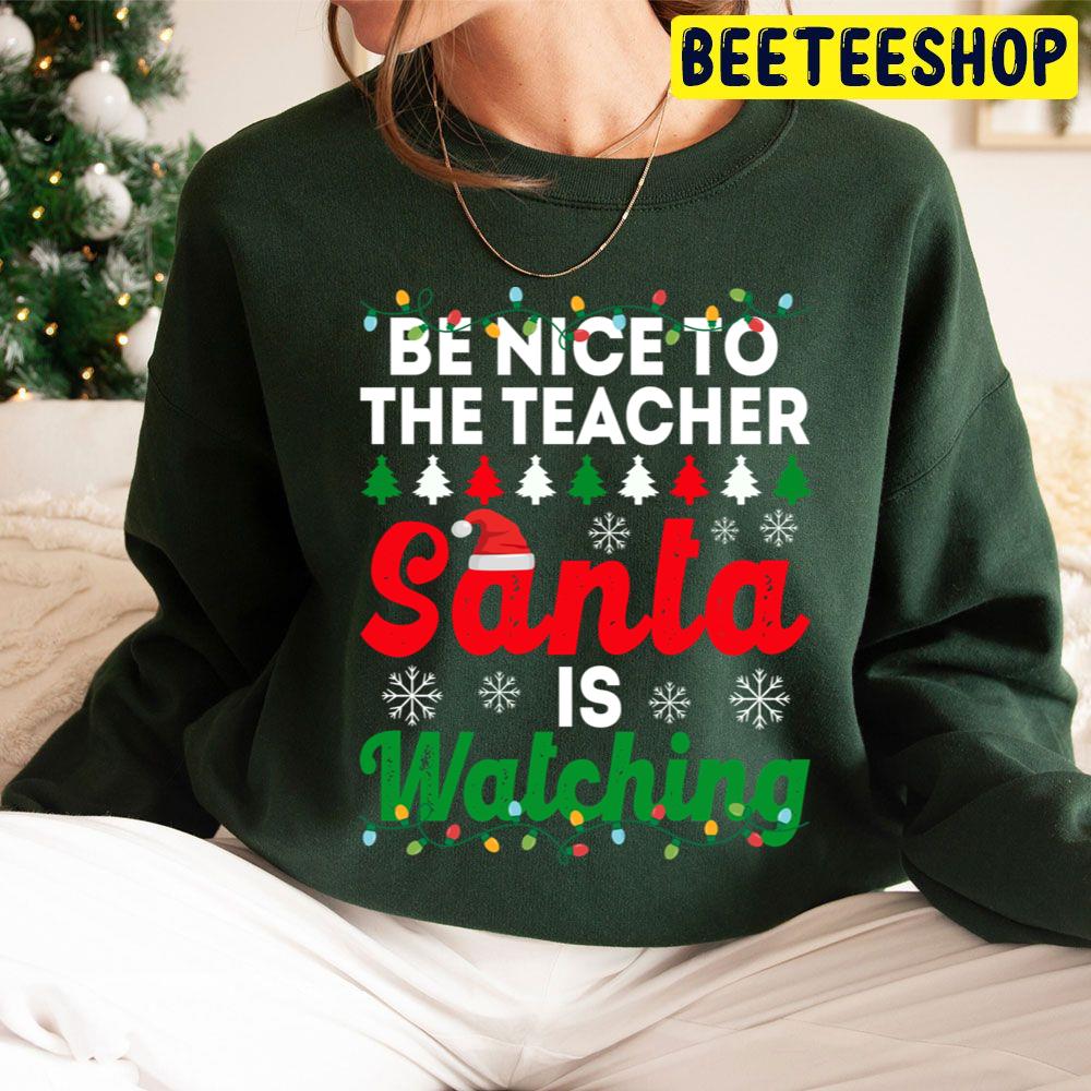 Be Nice To The Teacher Santa Is Watching Funny Chirstmas Trending Unisex Hoodie Be Nice To The Teacher Santa Is Watching Funny Chirstmas Trending Unisex Hoodie