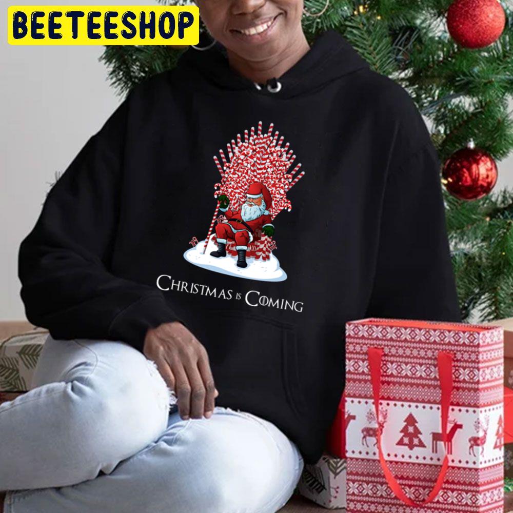 Christmas Is Coming Santa Candy Cane Throne Trending Unisex Hoodie Christmas Is Coming Santa Candy Cane Throne Trending Unisex Hoodie