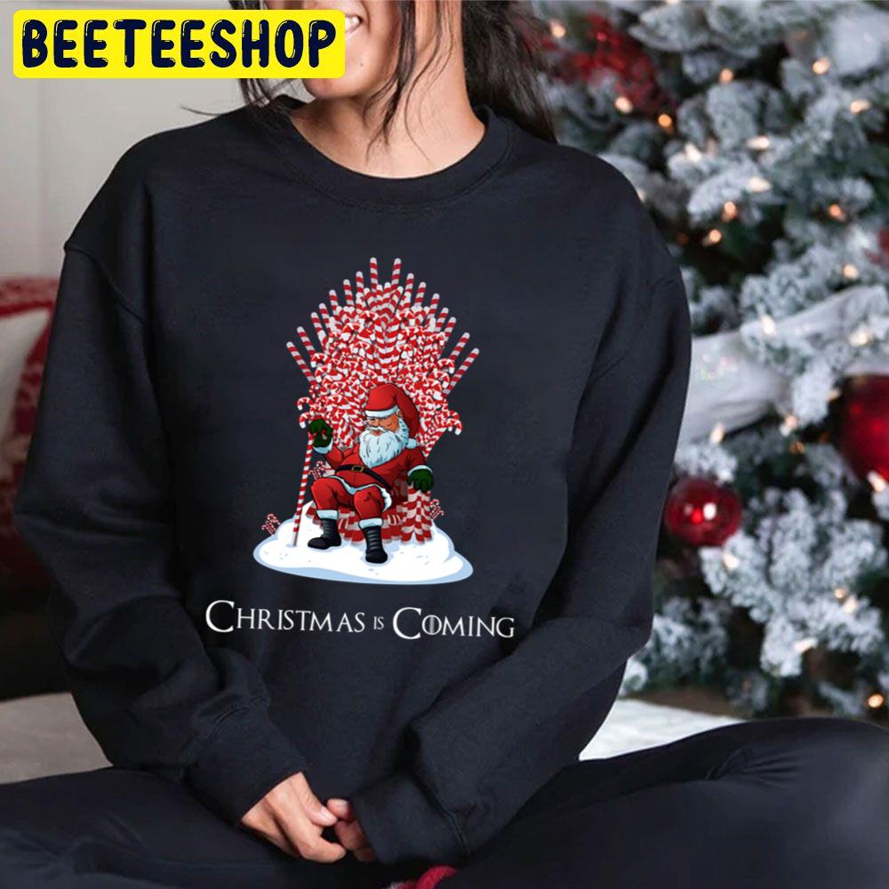 Christmas Is Coming Santa Candy Cane Throne Trending Unisex Hoodie Christmas Is Coming Santa Candy Cane Throne Trending Unisex Hoodie