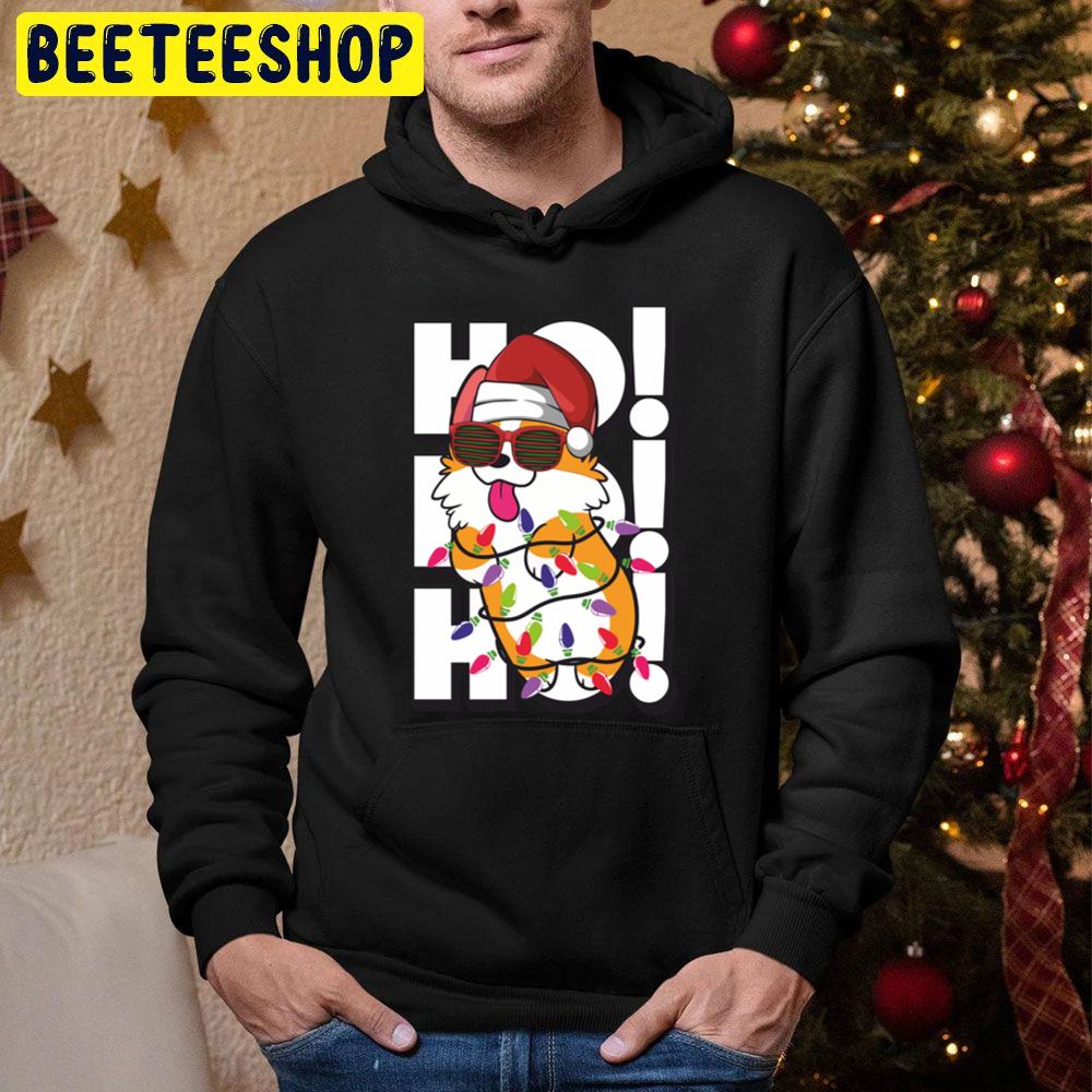 Cute And Witty Corgi Wrapped In Christmas Lights Wearing Santa Hat And Sunglasses Ho Ho Ho Trending Unisex Hoodie Cute And Witty Corgi Wrapped In Christmas Lights Wearing Santa Hat And Sunglasses Ho Ho Ho Trending Unisex Hoodie