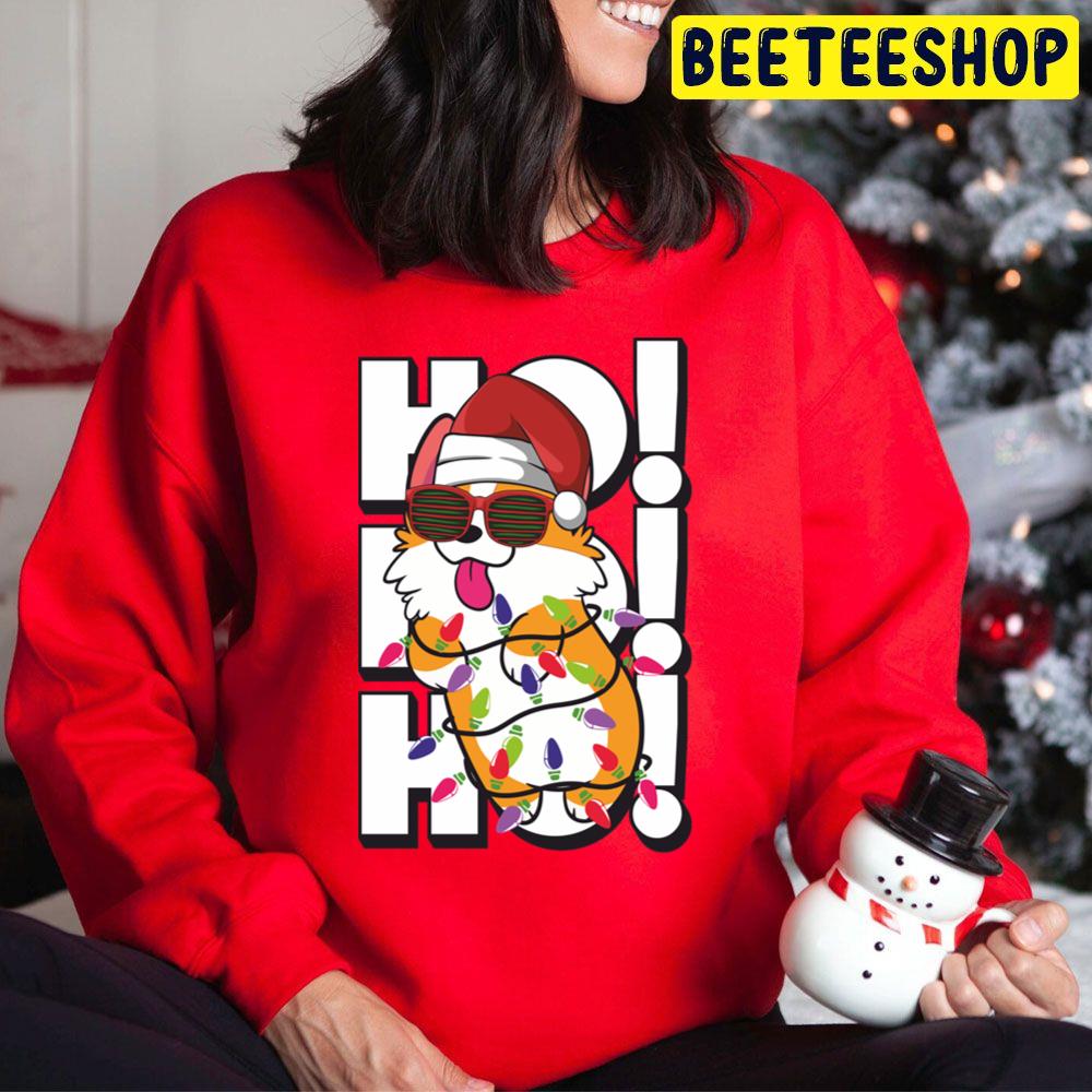 Cute And Witty Corgi Wrapped In Christmas Lights Wearing Santa Hat And Sunglasses Ho Ho Ho Trending Unisex Hoodie Cute And Witty Corgi Wrapped In Christmas Lights Wearing Santa Hat And Sunglasses Ho Ho Ho Trending Unisex Hoodie