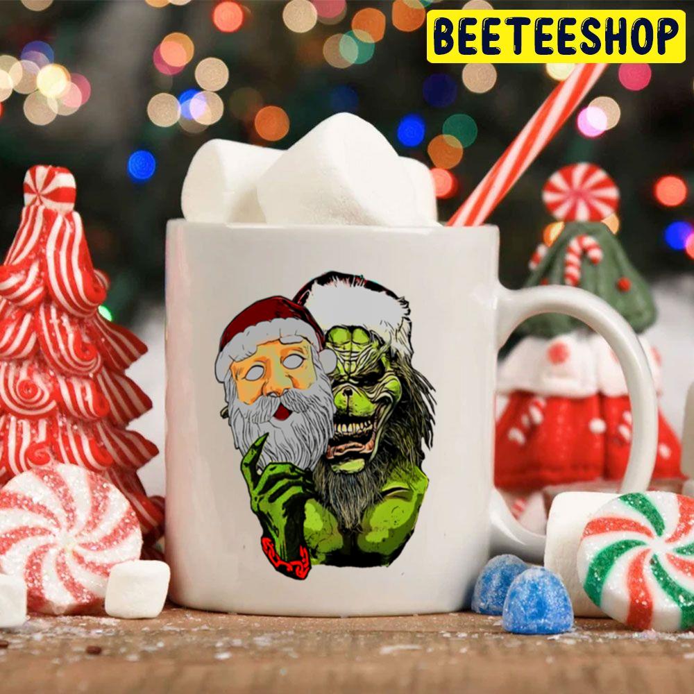 The Grinch With Santa Face Mask Christmas Trending Unisex Hoodie The Grinch With Santa Face Mask Christmas Trending Unisex Hoodie