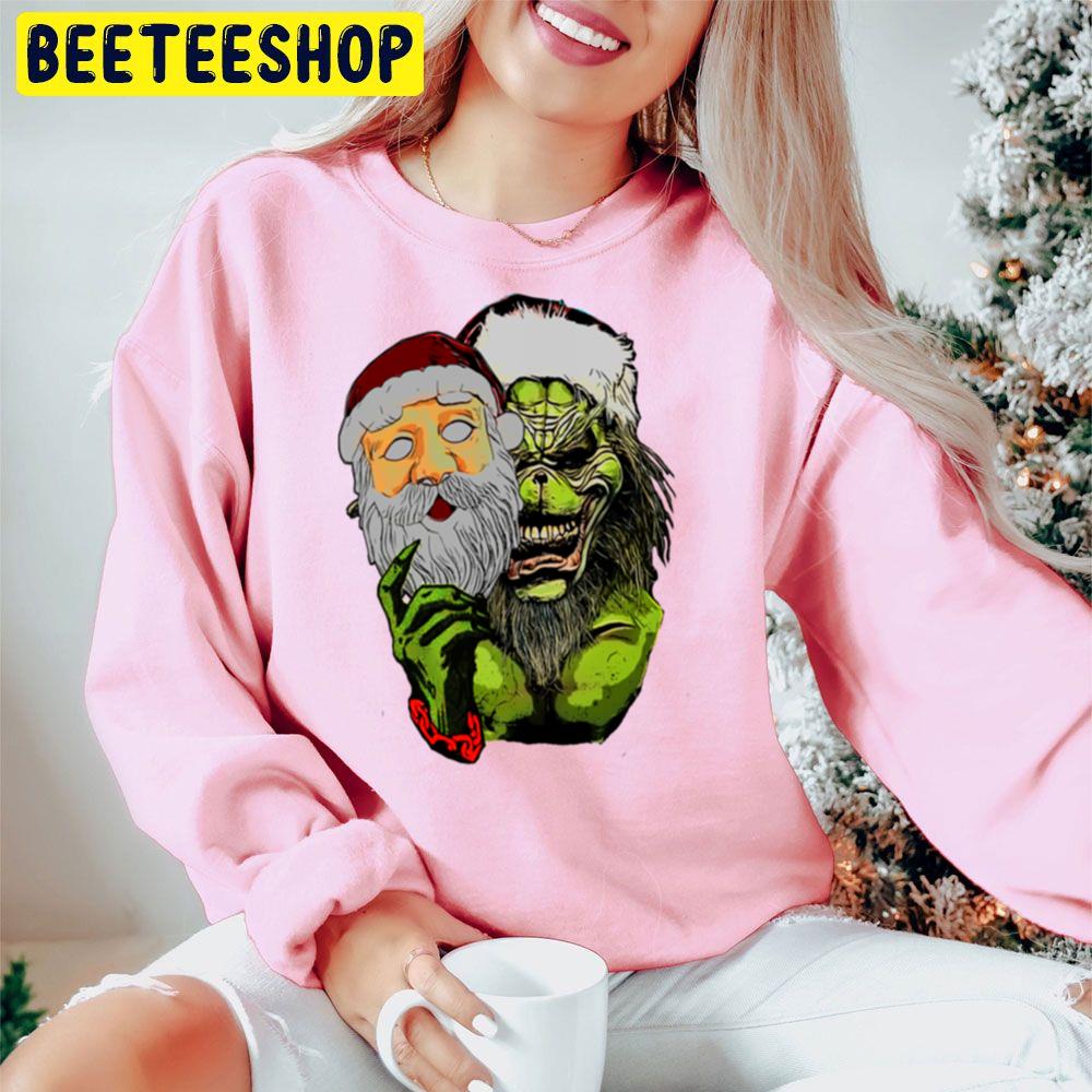 The Grinch With Santa Face Mask Christmas Trending Unisex Hoodie The Grinch With Santa Face Mask Christmas Trending Unisex Hoodie