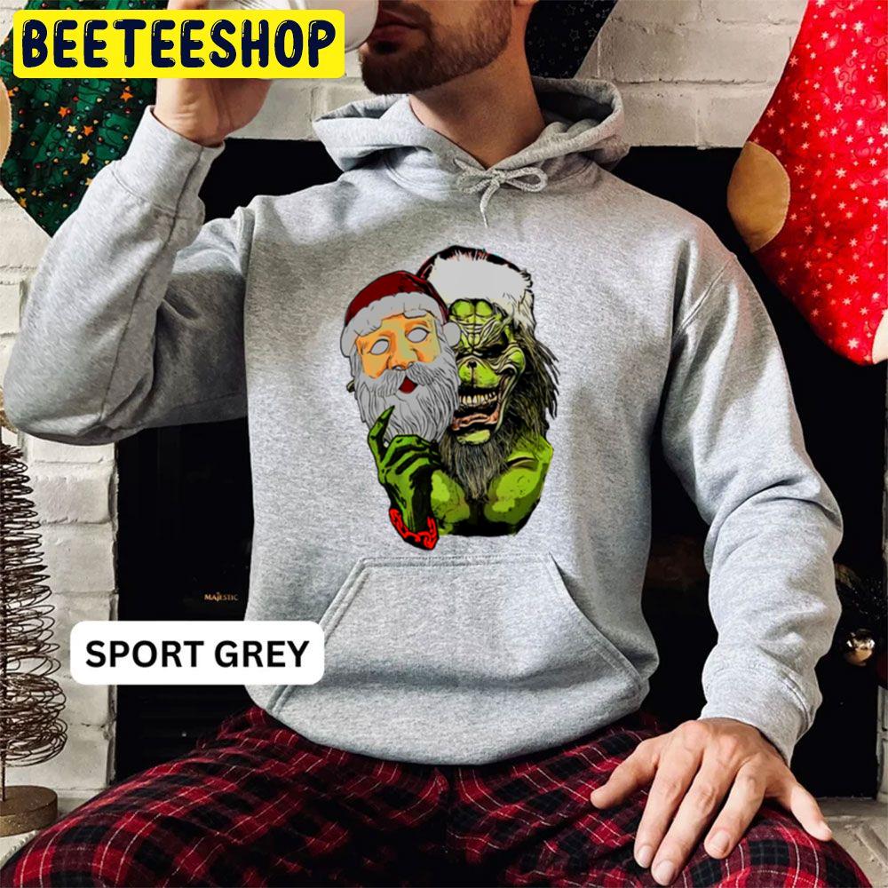 The Grinch With Santa Face Mask Christmas Trending Unisex Hoodie The Grinch With Santa Face Mask Christmas Trending Unisex Hoodie