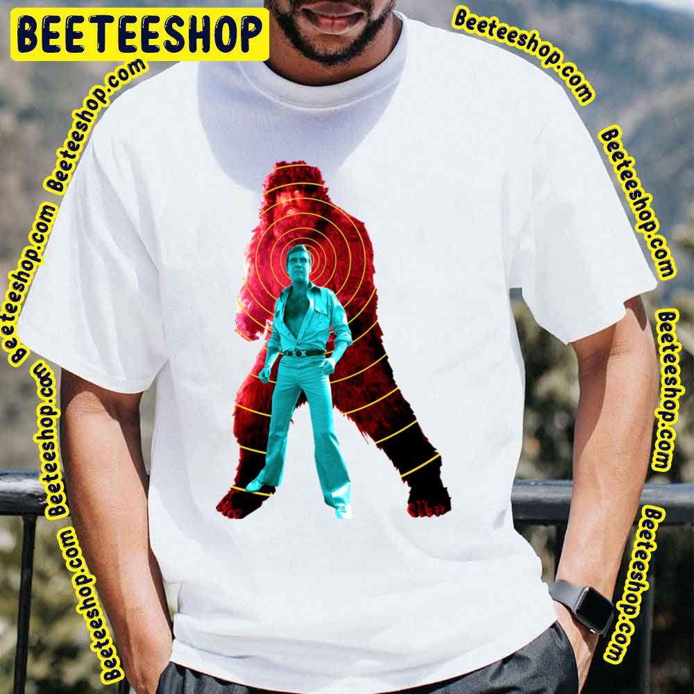The Six Million Dollar Man Steve Austin V Bigfoot 1970s Pop Art Trending Unisex T-Shirt The Six Million Dollar Man Steve Austin V Bigfoot 1970s Pop Art Trending Unisex T-Shirt