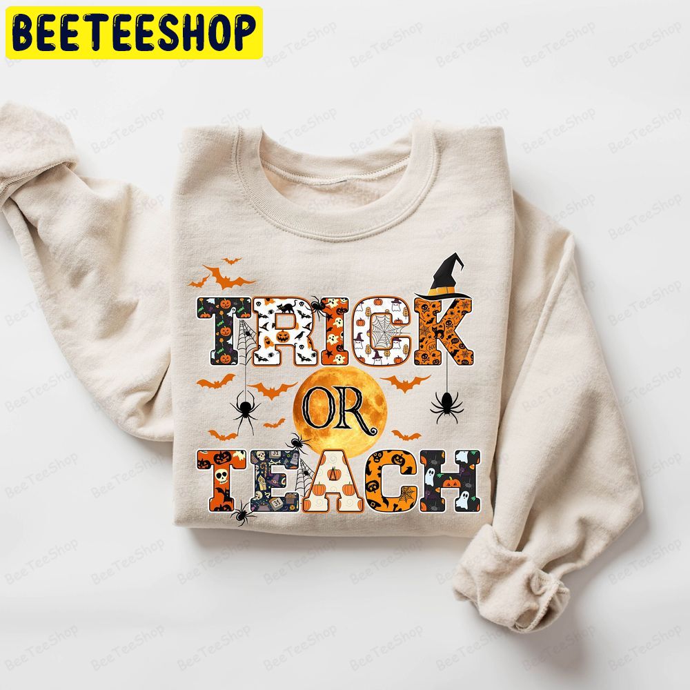 Trick Or Teach Spooky Teacher Halloween Trending Unisex T-Shirt Trick Or Teach Spooky Teacher Halloween Trending Unisex T-Shirt