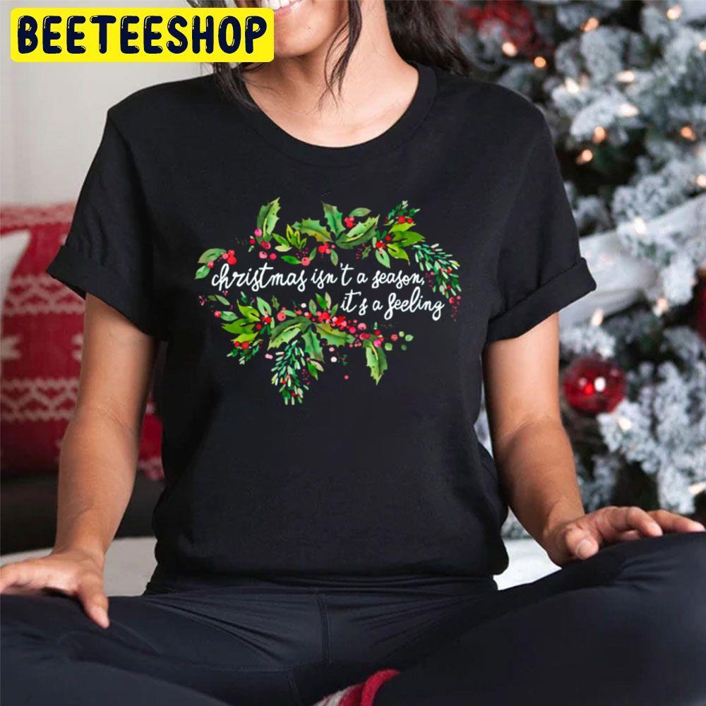 Christmas Isn't A Season It's A Feeling Beeteeshop Trending Unisex Hoodie Christmas Isn't A Season It's A Feeling Beeteeshop Trending Unisex Hoodie