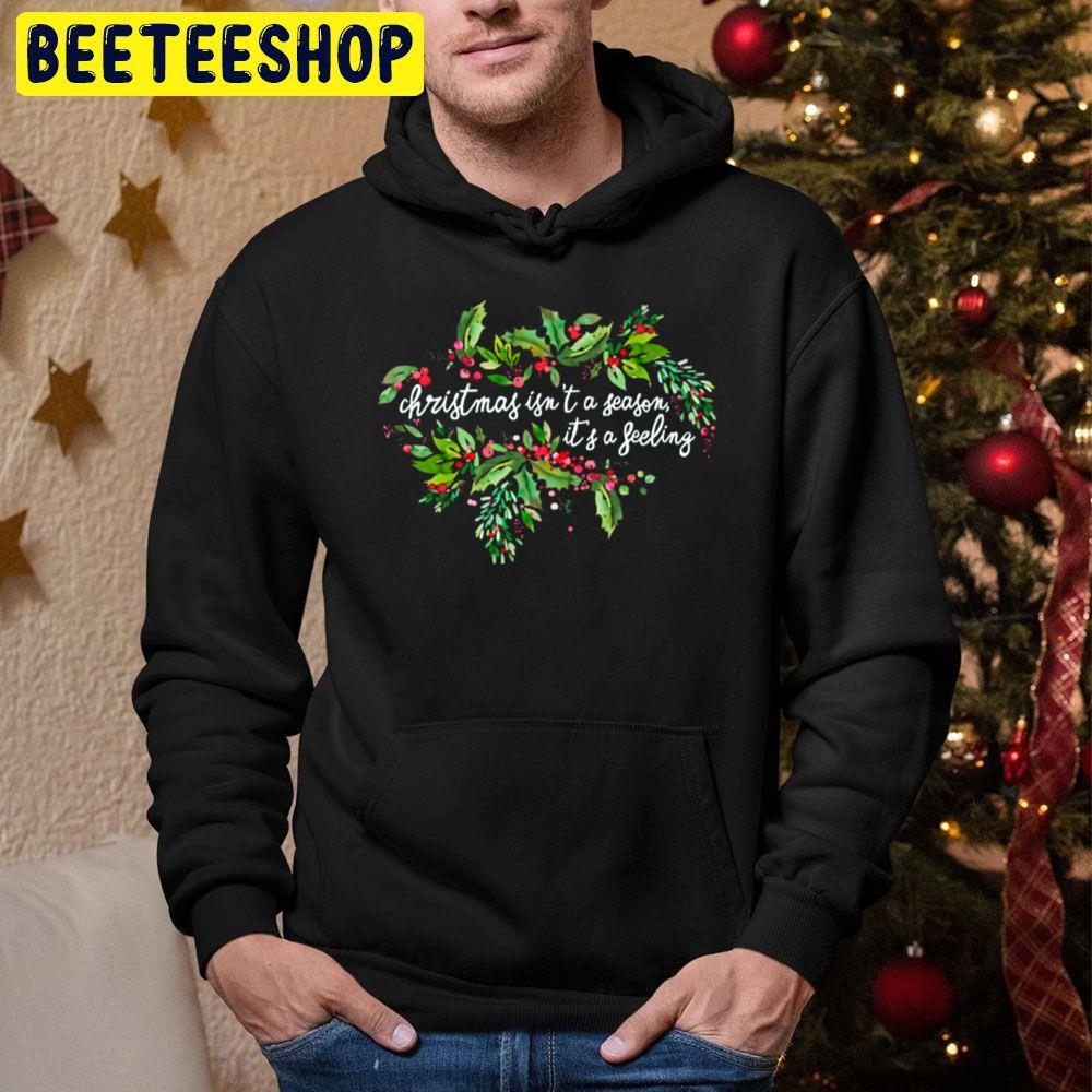Christmas Isn't A Season It's A Feeling Beeteeshop Trending Unisex Hoodie Christmas Isn't A Season It's A Feeling Beeteeshop Trending Unisex Hoodie