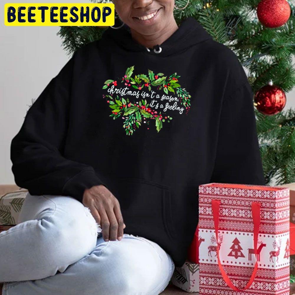 Christmas Isn't A Season It's A Feeling Beeteeshop Trending Unisex Hoodie Christmas Isn't A Season It's A Feeling Beeteeshop Trending Unisex Hoodie